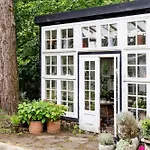 With Orangery Near And Forest