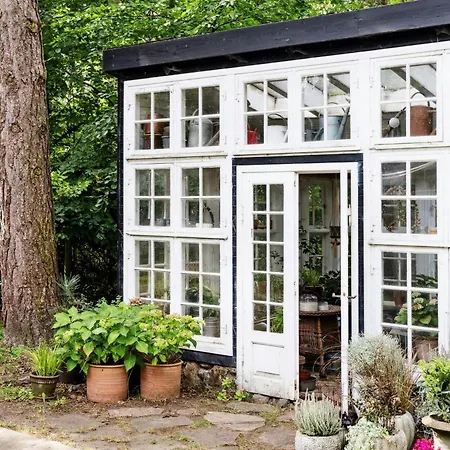 With Orangery Near And Forest